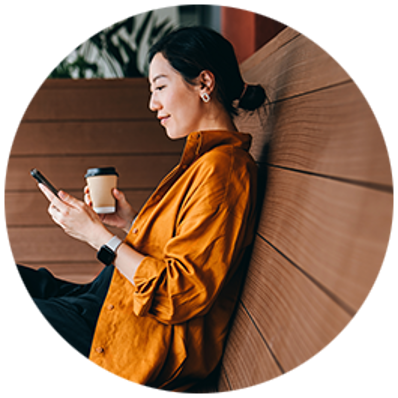 Woman at work looking at mobile phone