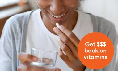 Woman taking vitamins with super Get $$$ back on vitamins
