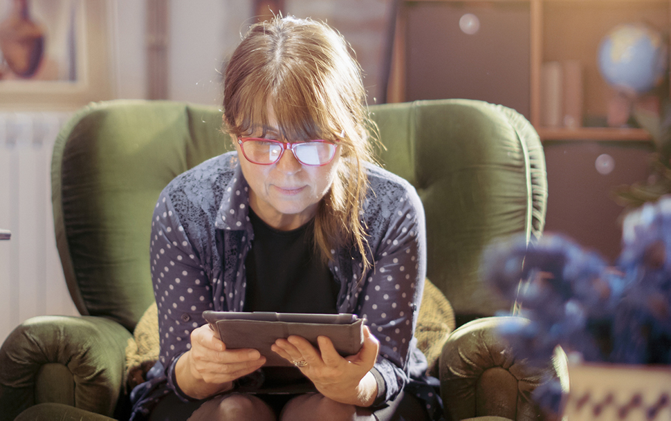 Woman reading iPad