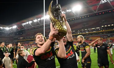 Penrith Panthers holding NRL trophy