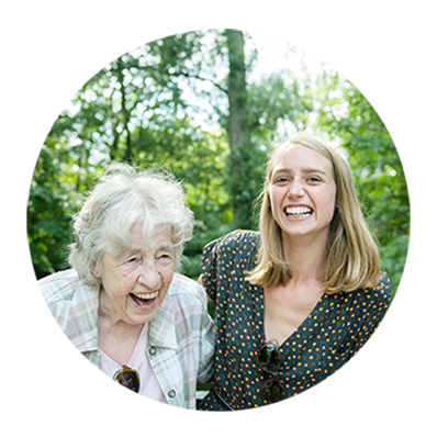 older woman and younger woman laughing