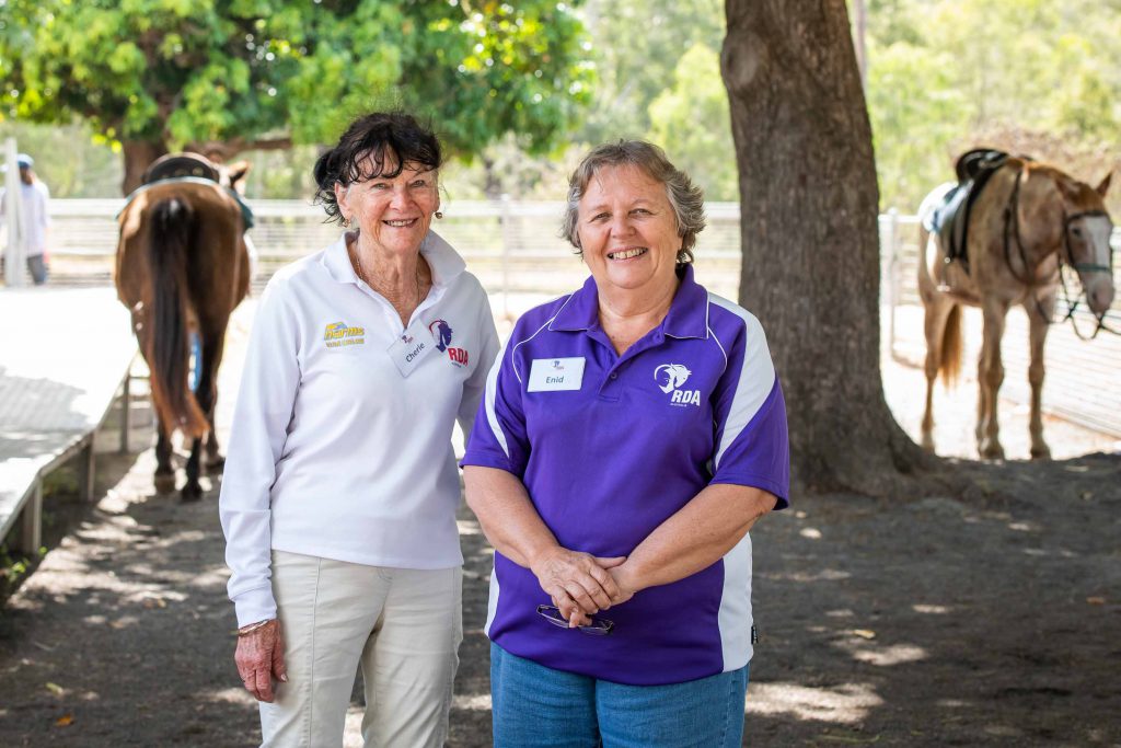 Volunteers at riding therapy