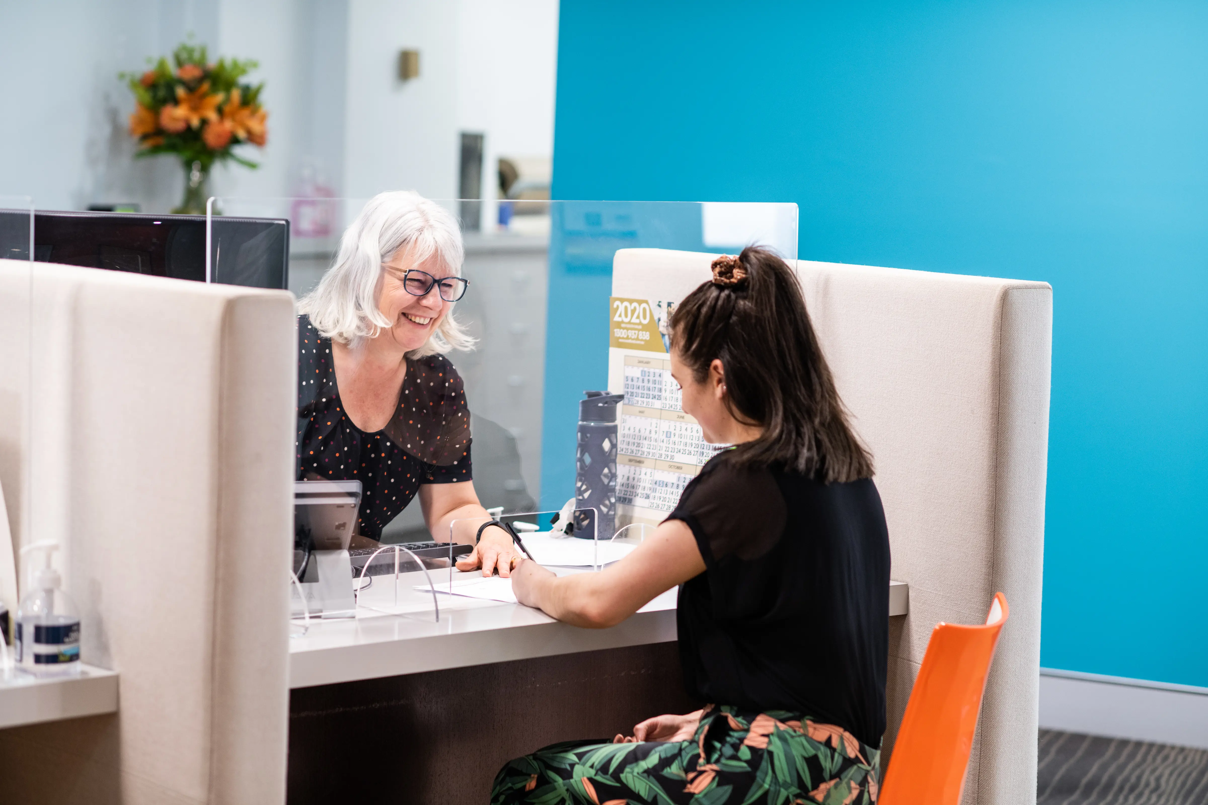 Westfund staff smiling to member