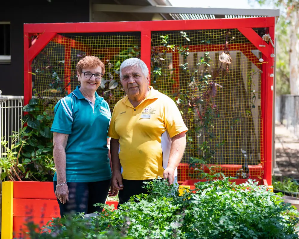 Man and woman smiling to camera