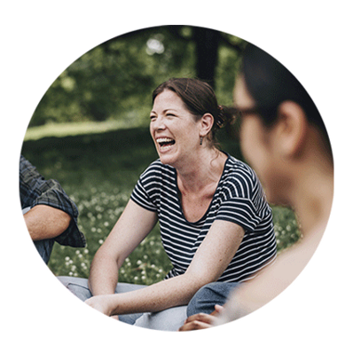 Woman outdoors smiling