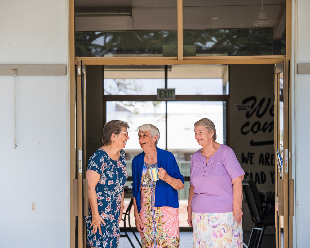 Group of older women chatting and laughing