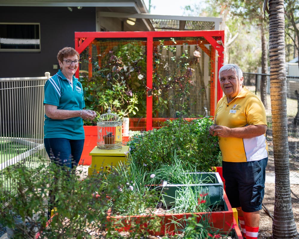 Man and woman gardening